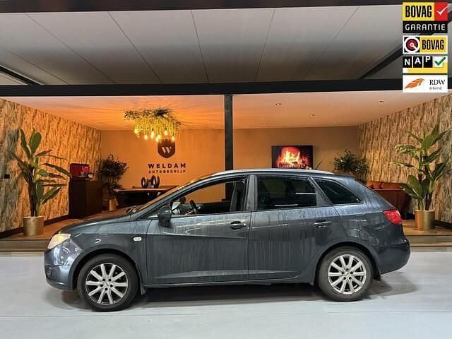 Grijs (metallic) Gebruikt 2011 Seat Ibiza ST Ecomotive Stationwagen | € 2.490 (Eerlijke prijs) - Afbeelding 1/4