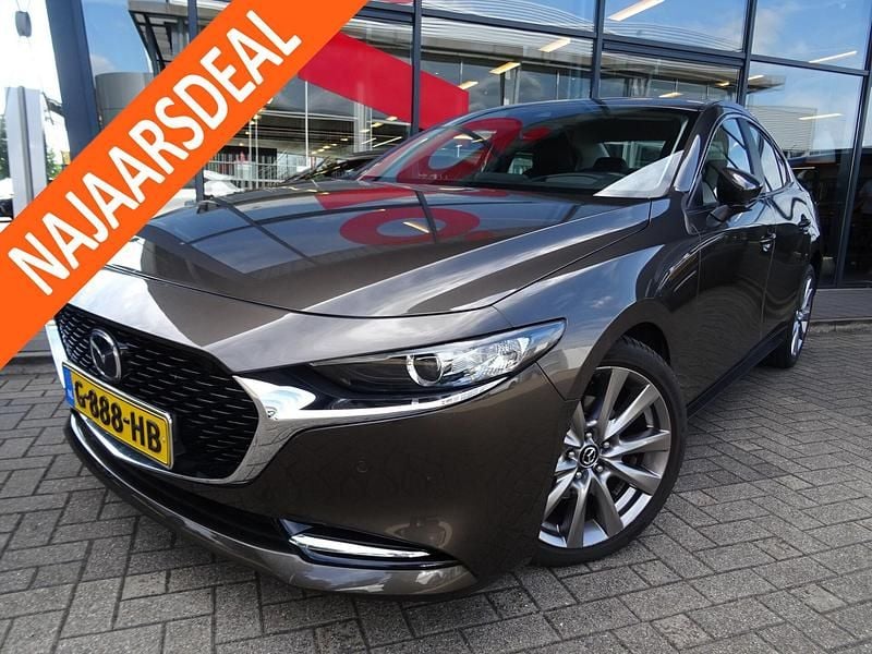 Bruin Gebruikt 2019 Mazda 3 Comfort Sedan | € 19.945 (Goede deal) - Afbeelding 1/4
