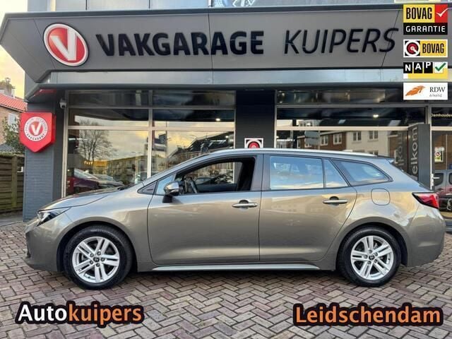 Bruin Gebruikt 2022 Toyota Corolla Business Edition Stationwagen | € 22.950 (Goede deal) - Afbeelding 1/4