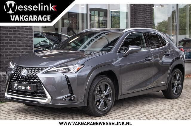 Grijs Gebruikt 2021 Lexus UX 250h Executive Line SUV | € 29.900 (Goede deal) - Afbeelding 1/4