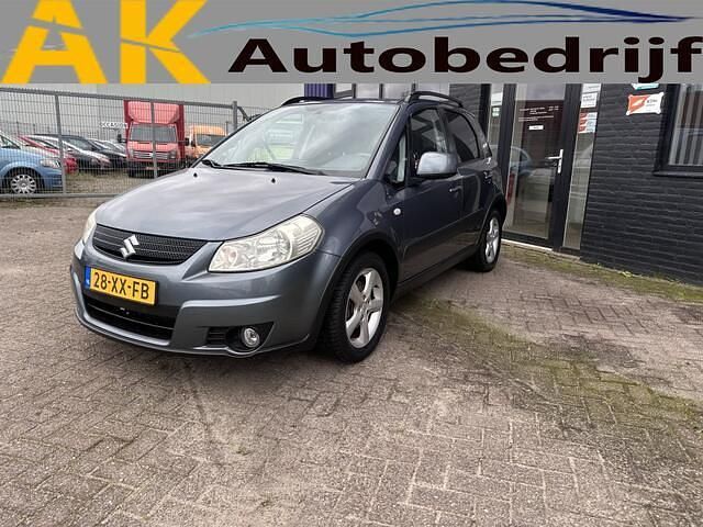 Grijs Gebruikt 2007 Suzuki SX4 MPV | € 3.149 (Eerlijke prijs) - Afbeelding 1/4