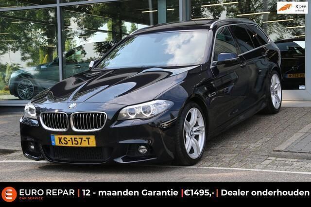 Zwart, metallic lak Gebruikt 2016 BMW 520 M Sport Stationwagen | € 21.995 (Duur) - Afbeelding 1/4