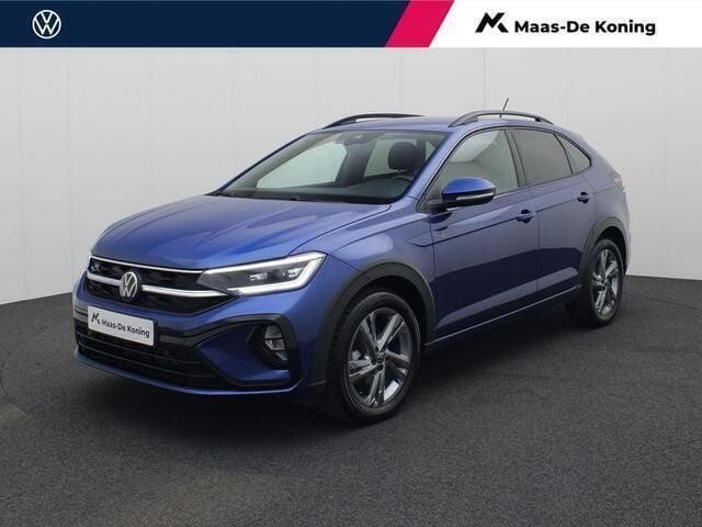 Blauw, metallic lak Gebruikt 2024 VW Taigo R-line SUV | € 28.740 (Eerlijke prijs) - Afbeelding 1/4