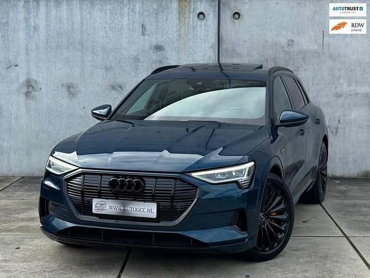 Blauw (metallic) Gebruikt 2020 Audi e-tron Business SUV | € 23.950 (Eerlijke prijs) - Afbeelding 1/4
