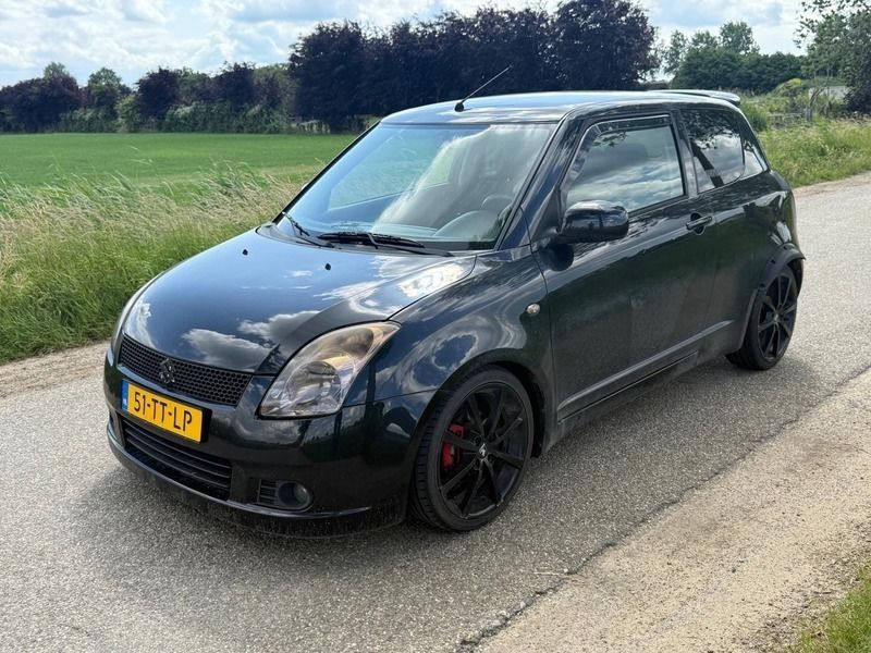 Zwart Gebruikt 2007 Suzuki Swift Exclusive Hatchback | € 1.000 (Goede deal) - Afbeelding 1/4