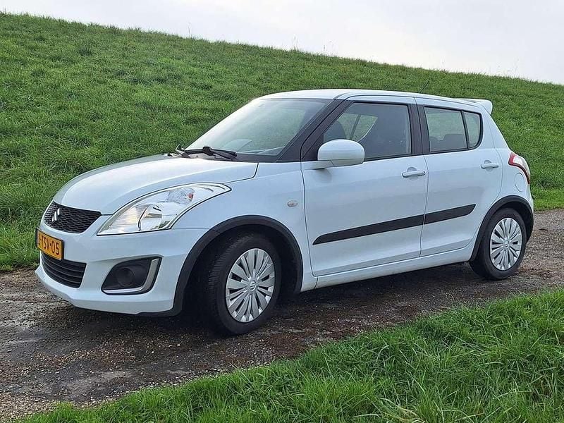 Wit Gebruikt 2014 Suzuki Swift Comfort Hatchback | € 6.350 (Goede deal) - Afbeelding 1/4