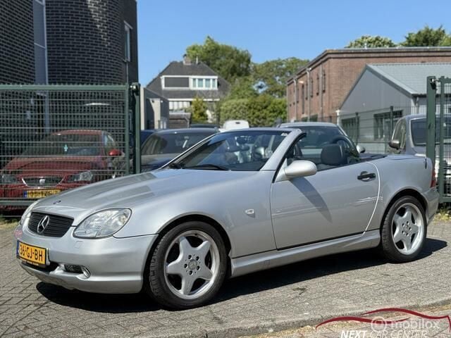 Grijs Gebruikt 1997 Mercedes SLK230 AMG Cabriolet | € 4.500 (Eerlijke prijs) - Afbeelding 1/4