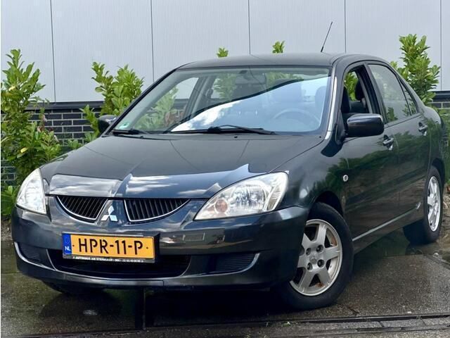 Grijs Gebruikt 2003 Mitsubishi Lancer Comfort Edition Sedan | € 4.450 (Iets duurder) - Afbeelding 1/4