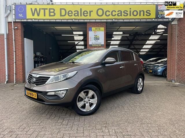 Bruin Gebruikt 2011 Kia Sportage Plus SUV | € 8.950 (Eerlijke prijs) - Afbeelding 1/4