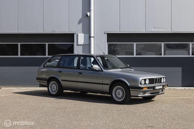 Grijs Gebruikt 1988 BMW 325 Stationwagen | € 19.999 - Afbeelding 1/4