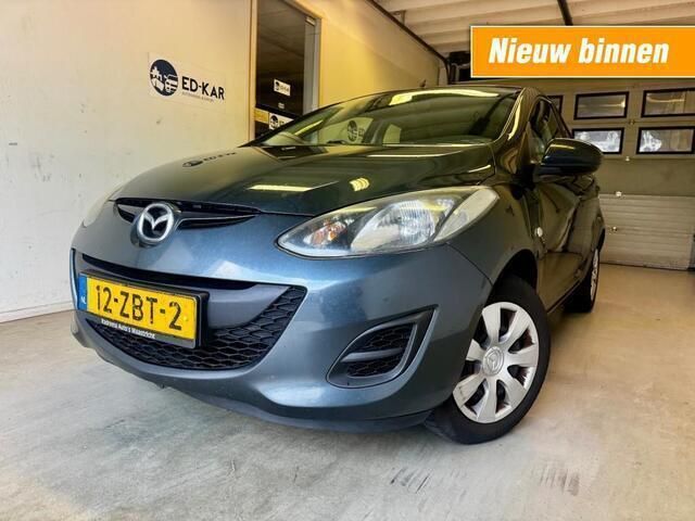 Grijs, metallic lak Gebruikt 2012 Mazda 2 Hatchback | € 3.995 (Eerlijke prijs) - Afbeelding 1/4