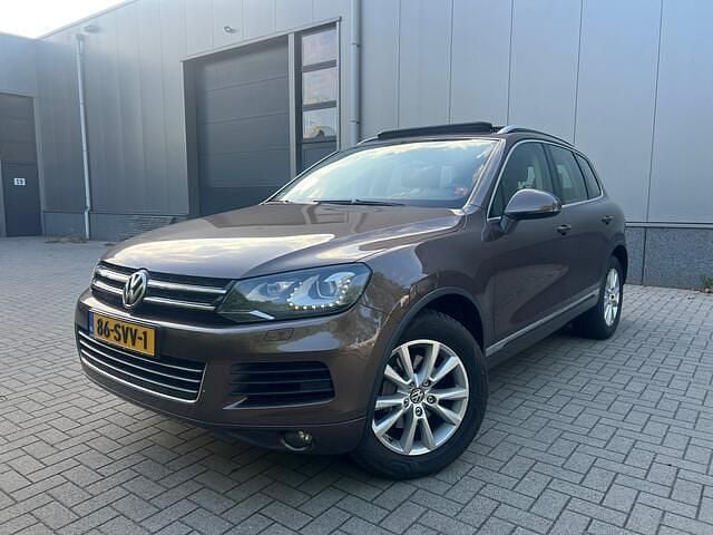Bruin Gebruikt 2011 VW Touareg Highline SUV | € 11.499 (Goede deal) - Afbeelding 1/4