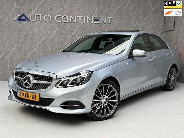 Grijs Gebruikt 2013 Mercedes E350 Avantgarde Sedan | € 13.950 (Eerlijke prijs) - Afbeelding 1/4