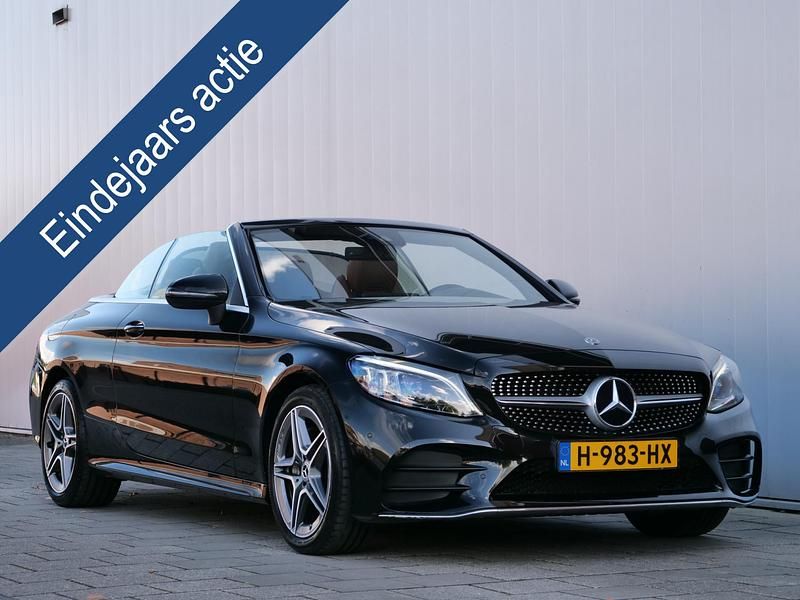 Zwart Gebruikt 2019 Mercedes C180 AMG Line Premium Plus Cabriolet | € 34.695 (Iets duurder) - Afbeelding 1/4
