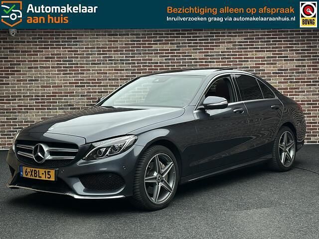 Grijs Occasion 2014 Mercedes C180 AMG line Sedan | € 17.495 (Iets duurder) - Afbeelding 1/4