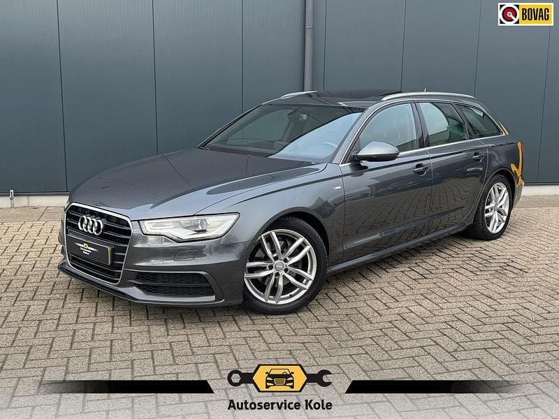 Grijs Occasion 2013 Audi A6 S-Line Stationwagen | € 14.835 (Iets duurder) - Afbeelding 1/4