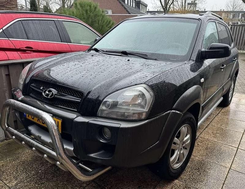 Zwart Occasion 2007 Hyundai Tucson Dynamiq SUV | € 3.150 (Goede deal) - Afbeelding 1/4