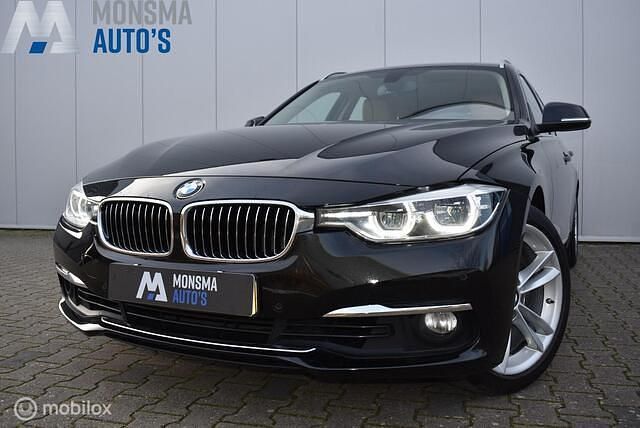 Occasion BMW 330 Executive 252 PK (185 kW) 2017 Zwart Stationwagen