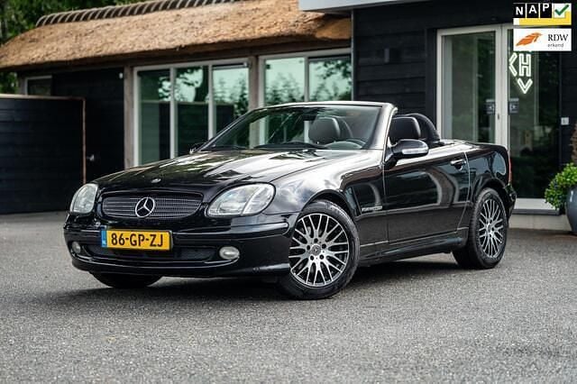 Zwart, metallic lak Gebruikt 2001 Mercedes SLK230 Cabriolet | € 6.969 (Iets duurder) - Afbeelding 1/4