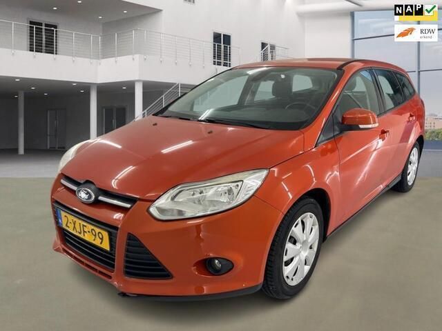 Oranje Gebruikt 2011 Ford Focus Trend Stationwagen | € 3.740 (Goede deal) - Afbeelding 1/4