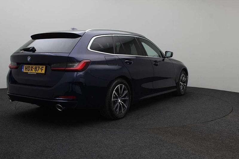 Occasion BMW 320e Sport Line 204 PK (150 kW) 2023 Blauw (metallic) Stationwagen