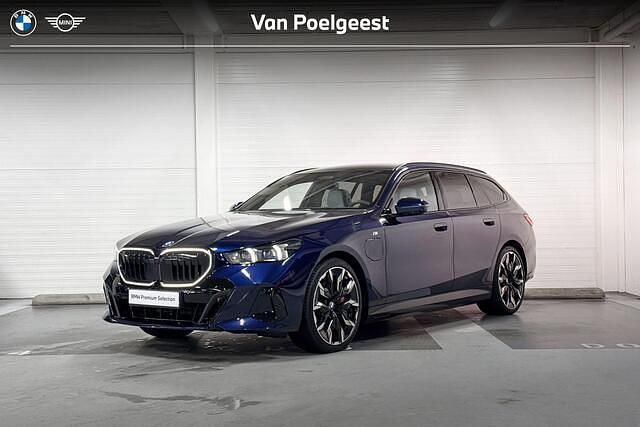 Occasion BMW 550e Comfort Edition 489 PK (359 kW) 2025 Blauw Stationwagen