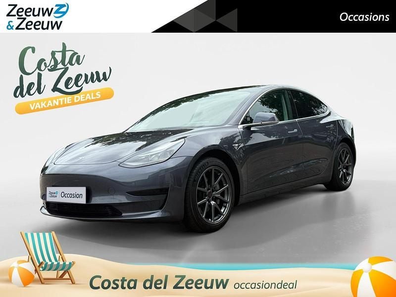 Grijs Gebruikt 2020 Tesla Model 3 Standard Range Sedan | € 23.939 (Eerlijke prijs) - Afbeelding 1/4