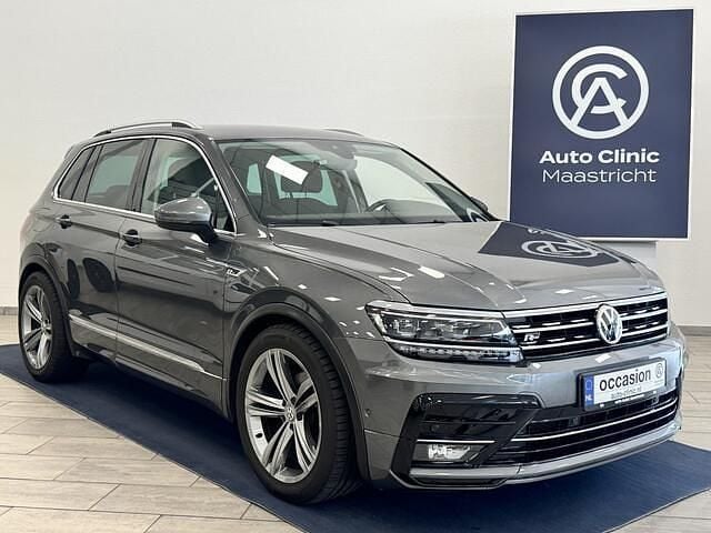 Grijs, metallic lak Gebruikt 2018 VW Tiguan R-line SUV | € 25.945 (Goede deal) - Afbeelding 1/4