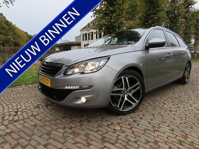 Grijs Gebruikt 2015 Peugeot 308 Stationwagen | € 4.495 (Goede deal) - Afbeelding 1/4