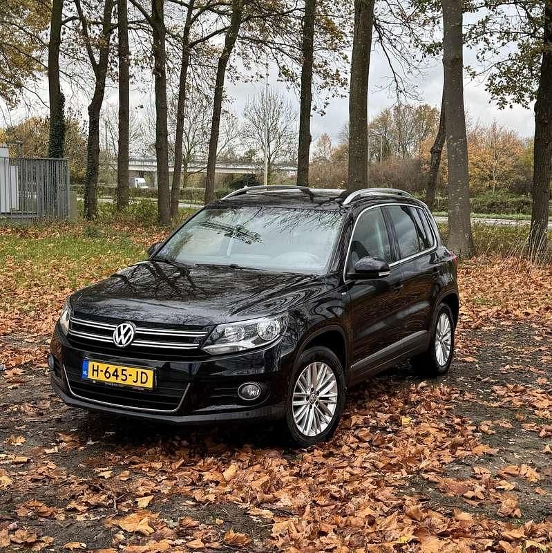 Zwart Gebruikt 2014 VW Tiguan Sport SUV | € 9.500 (Goede deal) - Afbeelding 1/4