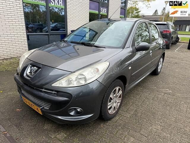 Grijs Gebruikt 2010 Peugeot 206+ Premium Hatchback | € 2.750 (Eerlijke prijs) - Afbeelding 1/4