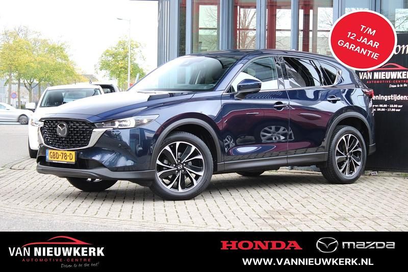 Blauw (parellak) Gebruikt 2024 Mazda CX-5 Comfort SUV | € 40.900 (Iets duurder) - Afbeelding 1/4