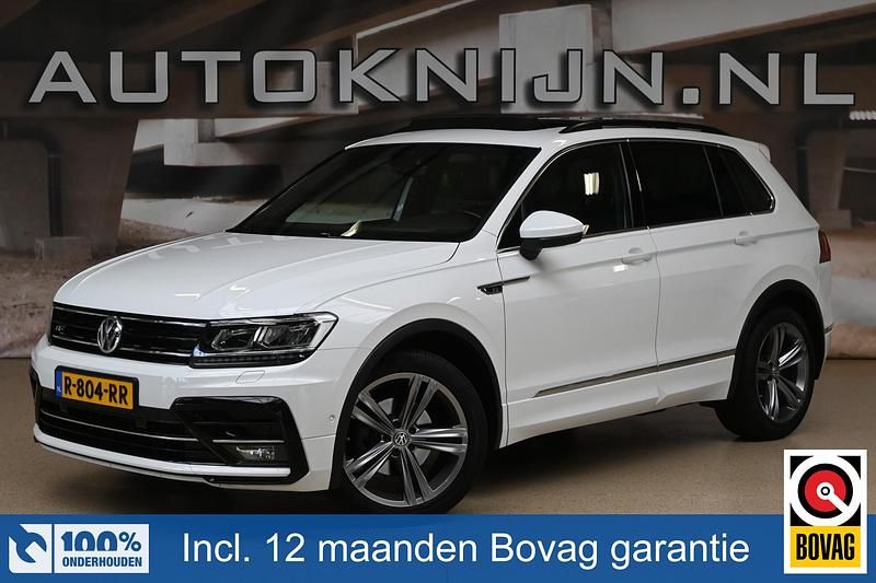 Wit Occasion 2022 VW Tiguan Highline SUV | € 25.995 - Afbeelding 1/4
