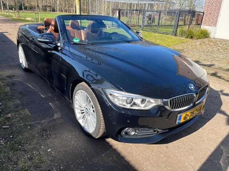 Blauw, metallic lak Gebruikt 2015 BMW 428 Executive Cabriolet | € 20.950 (Eerlijke prijs) - Afbeelding 1/4