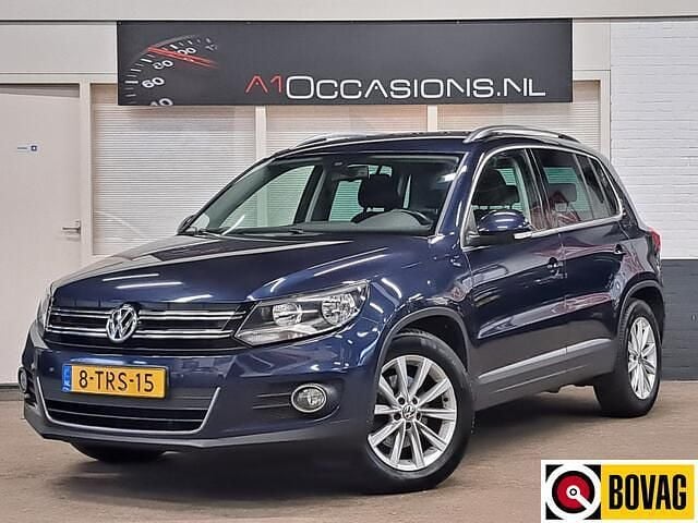 Blauw Gebruikt 2014 VW Tiguan Sport SUV | € 10.995 (Goede deal) - Afbeelding 1/4