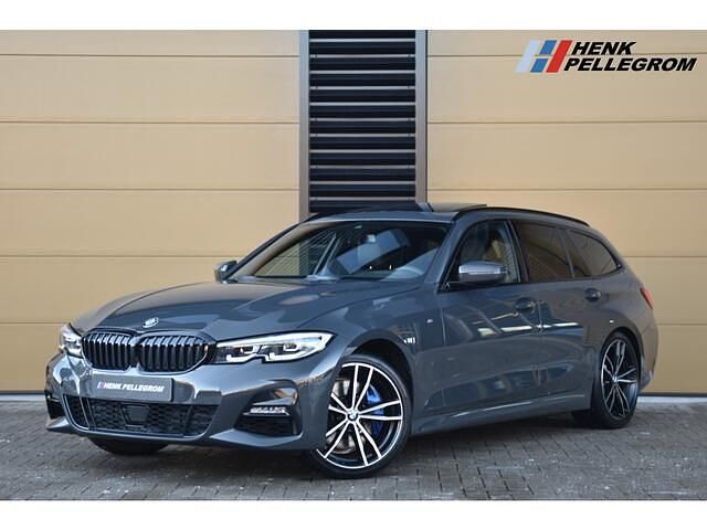 Grijs Occasion 2022 BMW 320 M Sport Stationwagen | € 31.950 (Eerlijke prijs) - Afbeelding 1/4