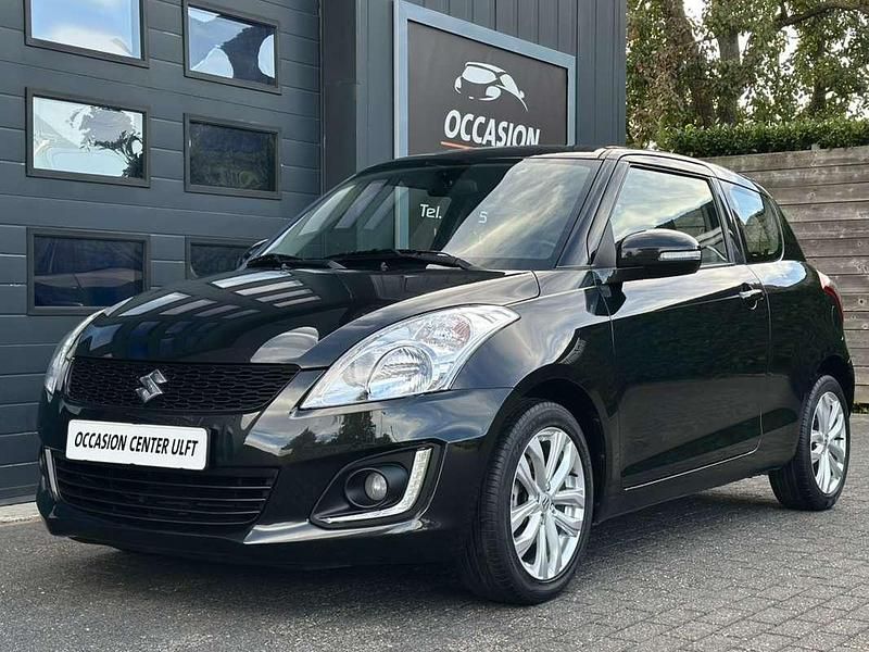 Zwart Gebruikt 2014 Suzuki Swift Hatchback | € 7.450 (Eerlijke prijs) - Afbeelding 1/3