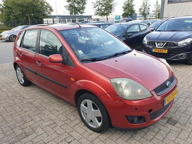 Oranje Gebruikt 2006 Ford Fiesta Futura Hatchback | € 1.099 (Goede deal) - Afbeelding 1/4