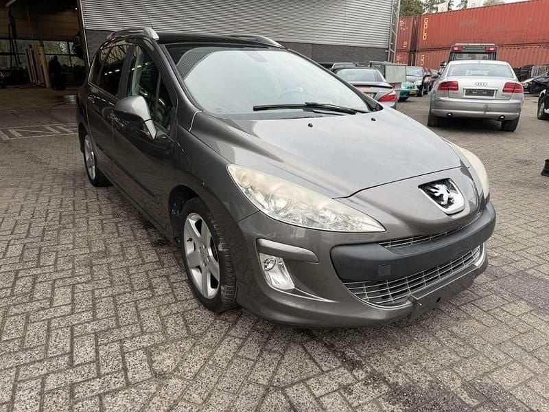 Grijs Gebruikt 2009 Peugeot 308 SW Stationwagen | € 990 (Super prijs) - Afbeelding 1/4