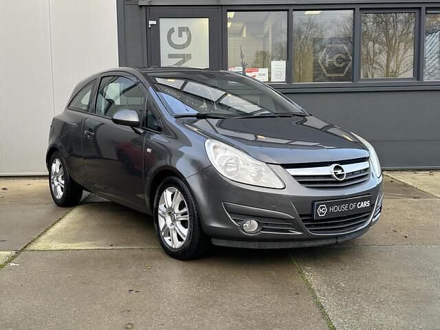 Grijs (metallic) Occasion 2011 Opel Corsa Cosmo Hatchback | € 3.995 (Eerlijke prijs) - Afbeelding 1/4