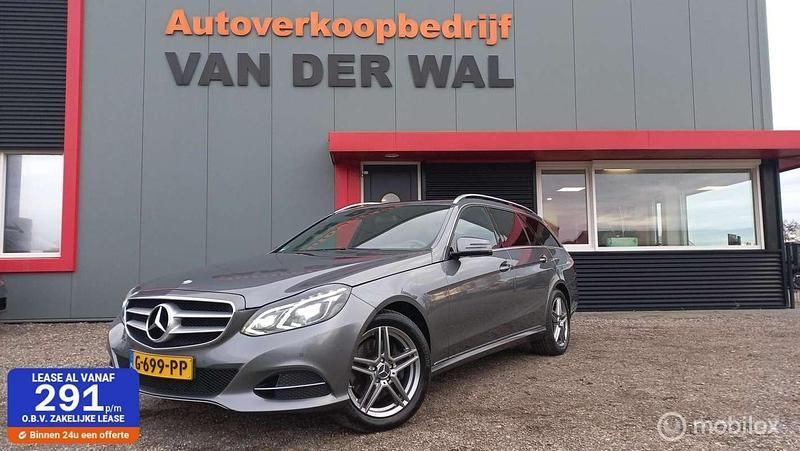 Grijs (metallic) Gebruikt 2016 Mercedes E220 Ambition Stationwagen | € 17.999 (Eerlijke prijs) - Afbeelding 1/4