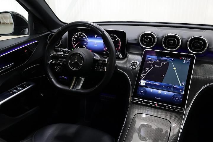 Occasion Mercedes C220 AMG line 2023 Zwart (metallic) Stationwagen