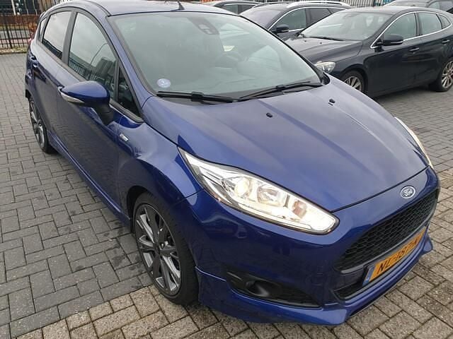Blauw (metallic) Gebruikt 2017 Ford Fiesta ST-Line Hatchback | € 5.999 (Super prijs) - Afbeelding 1/4