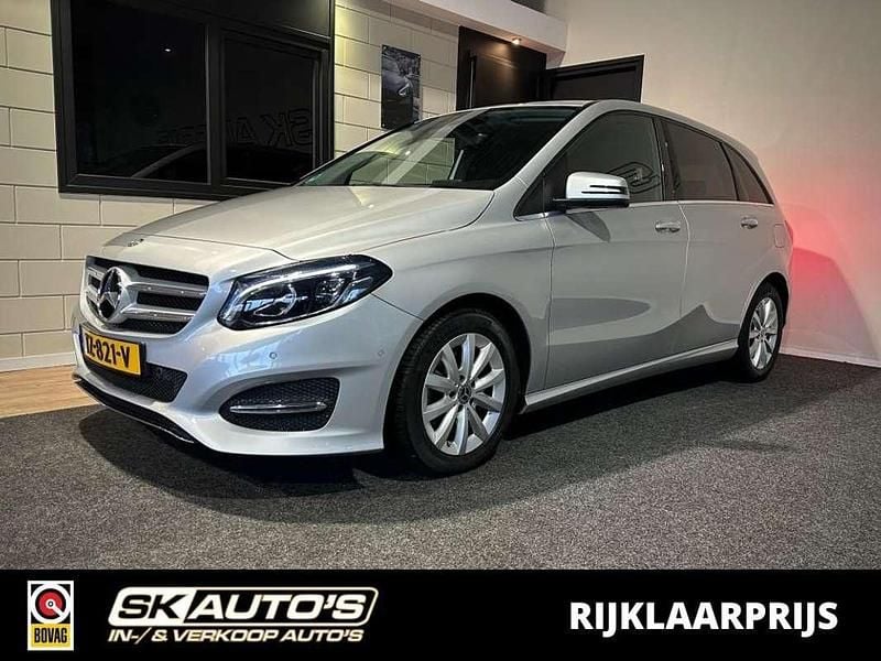 Grijs Gebruikt 2018 Mercedes B180 Ambition MPV | € 18.995 (Eerlijke prijs) - Afbeelding 1/4