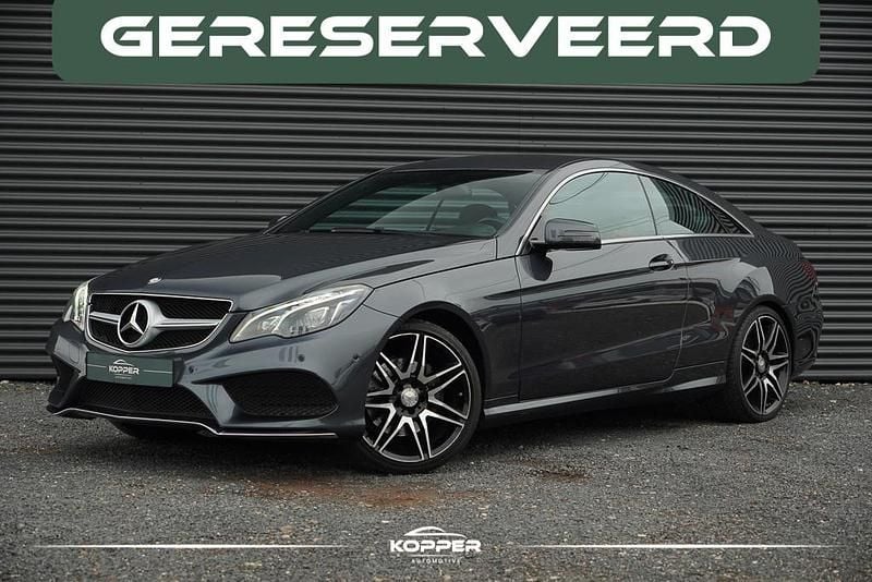Grijs Gebruikt 2015 Mercedes E200 Prestige Coupé | € 20.500 (Eerlijke prijs) - Afbeelding 1/4