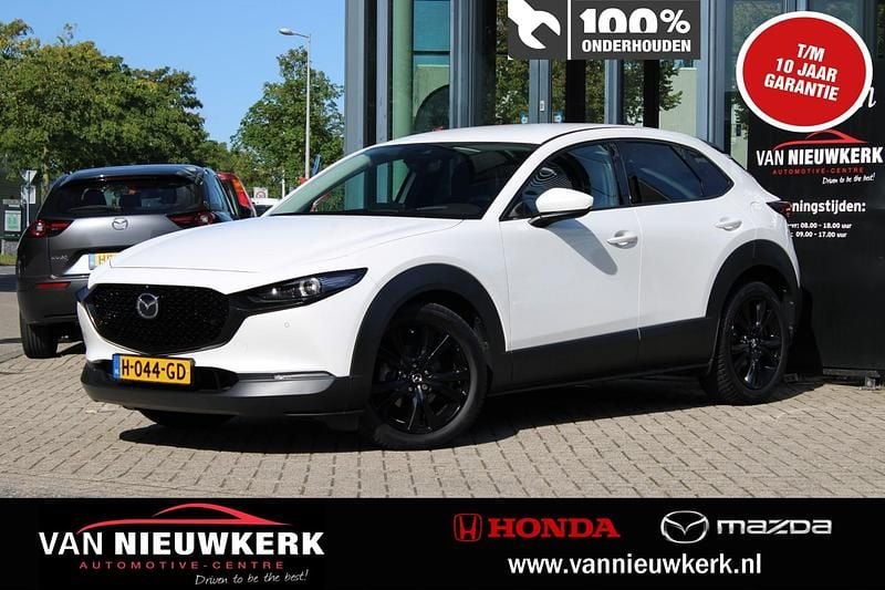 Snowflake white pearl (wit mica) Gebruikt 2020 Mazda CX-30 Edition SUV | € 24.900 (Eerlijke prijs) - Afbeelding 1/4