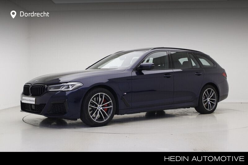 Bmw individual tansanit metallic (blauw metallic) Gebruikt 2021 BMW 530e Comfort Edition Stationwagen | € 43.895 (Duur) - Afbeelding 1/4