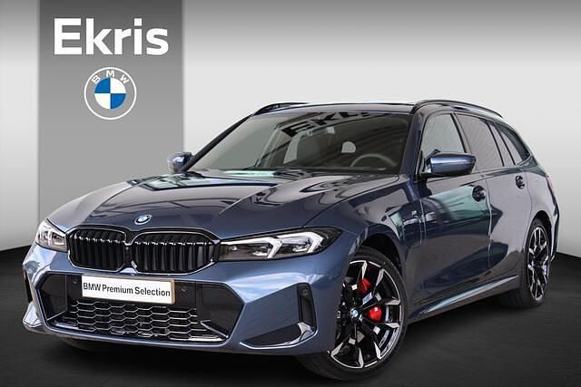Blauw Nieuw 2025 BMW 330 M Sport Stationwagen | € 77.198 - Afbeelding 1/4