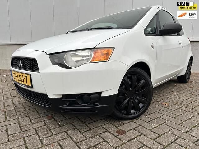 Wit Gebruikt 2010 Mitsubishi Colt Edition Hatchback | € 1.995 (Goede deal) - Afbeelding 1/4