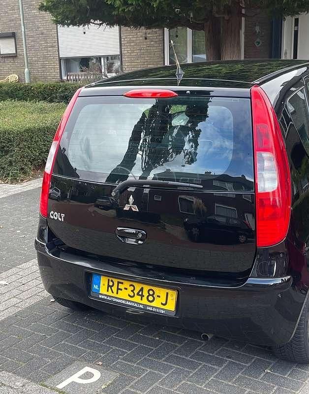 Zwart Gebruikt 2005 Mitsubishi Colt Inform Hatchback | € 1.300 (Iets duurder) - Afbeelding 1/4